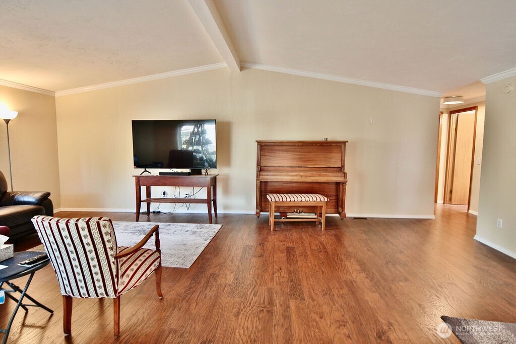 161 Fircrest Drive Sequim, WA 98382 - Photo 7 of 33 a living room with furniture and a flat screen tv