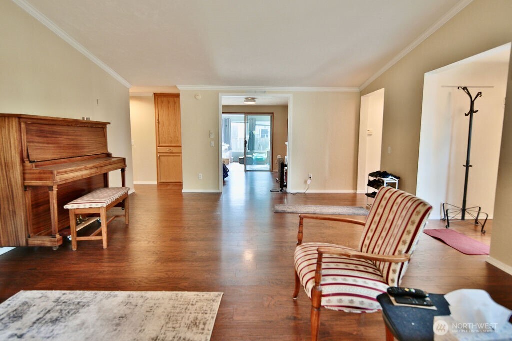 161 Fircrest Drive Sequim, WA 98382 - Photo 9 of 33 a living room with furniture and wooden floor