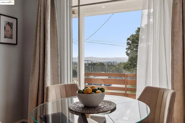 a kitchen with stainless steel appliances a refrigerator sink and cabinets