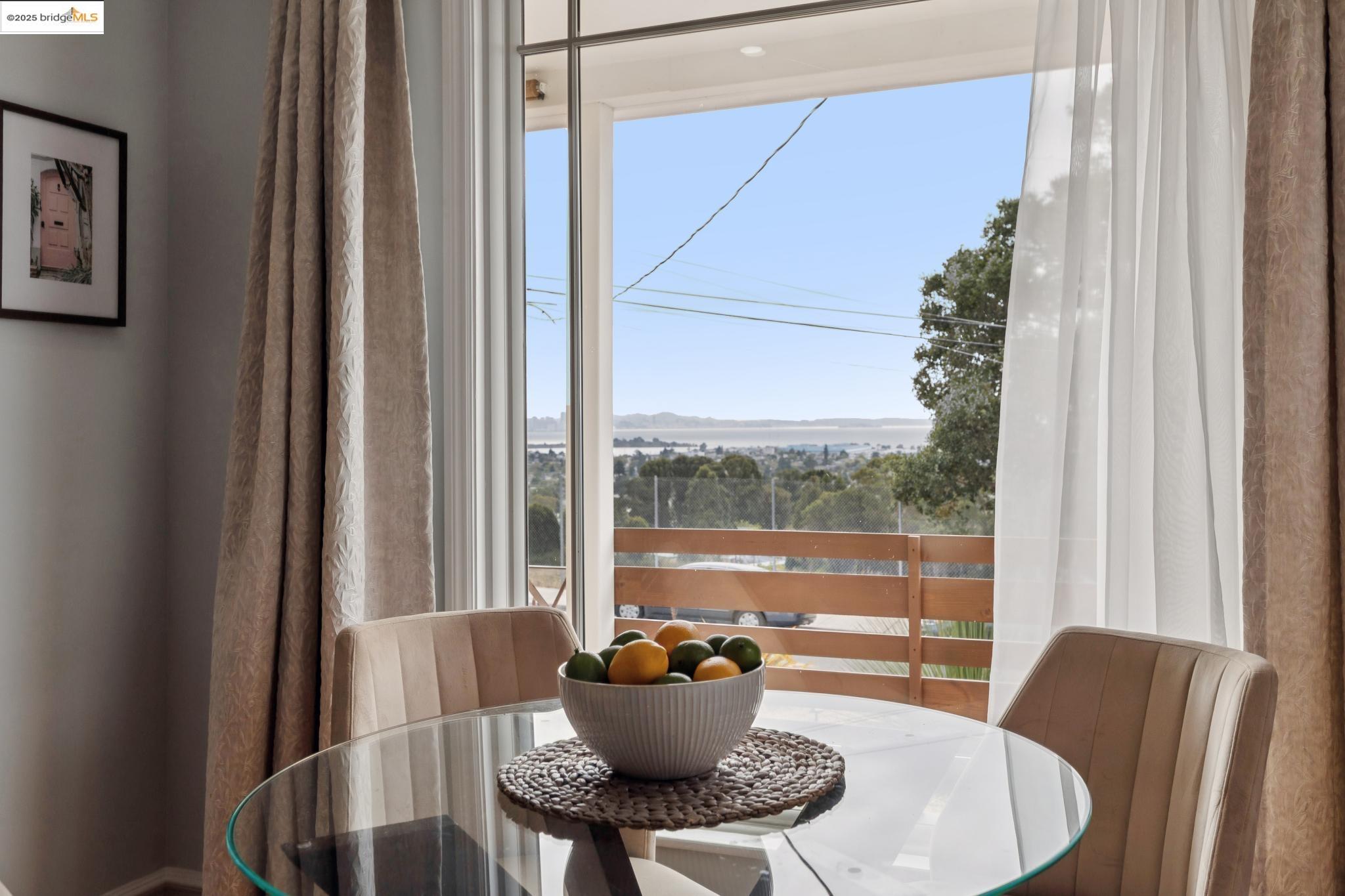 1034 Navellier Street El Cerrito, CA 94530 - Photo 14 of 57 a view of a dining room with furniture window and outside view