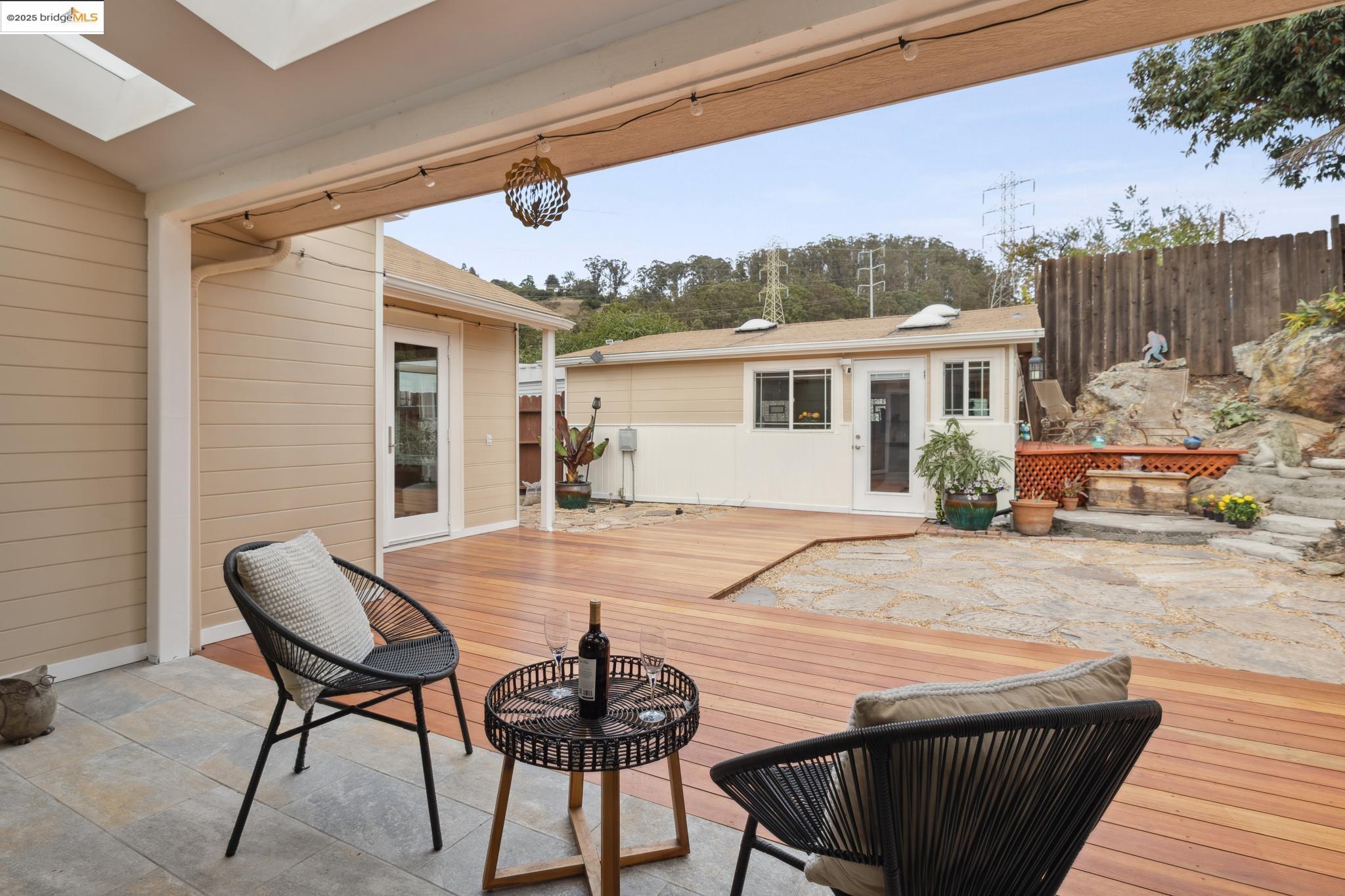 1034 Navellier Street El Cerrito, CA 94530 - Photo 44 of 57 a view of a house with backyard and sitting area