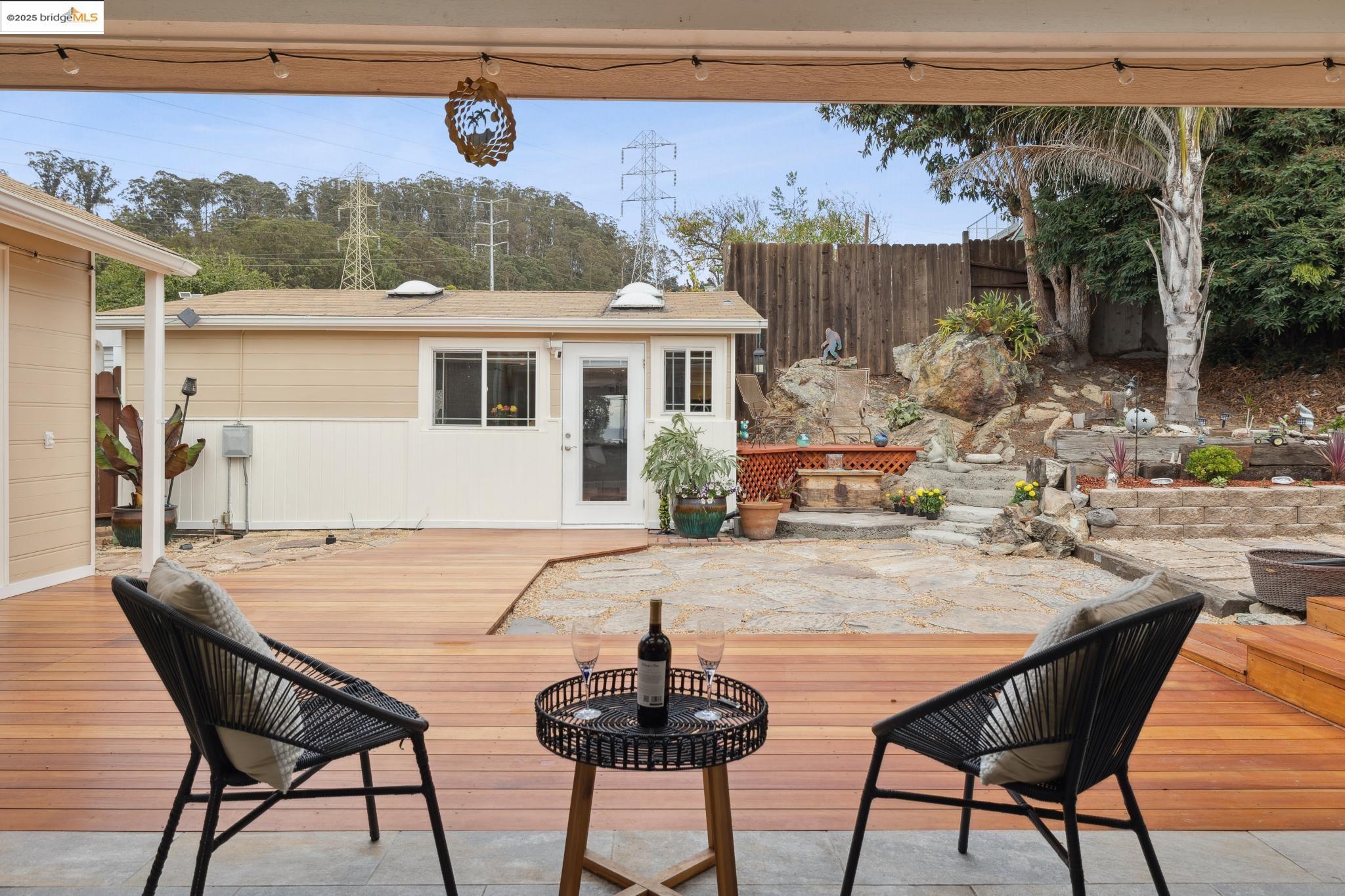1034 Navellier Street El Cerrito, CA 94530 - Photo 45 of 57 a view of a patio with table and chairs and potted plants