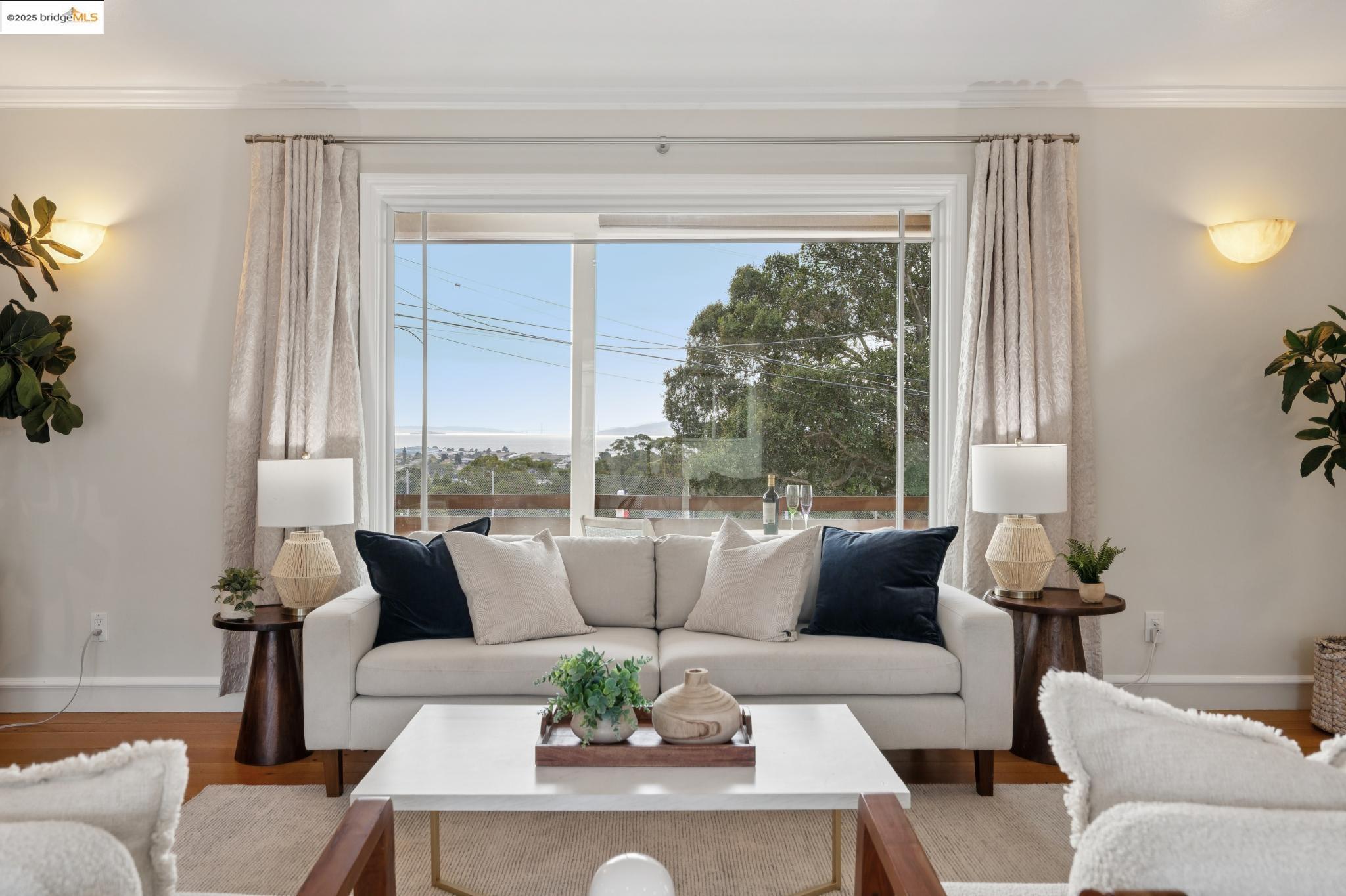 1034 Navellier Street El Cerrito, CA 94530 - Photo 10 of 57 a living room with furniture and a large window