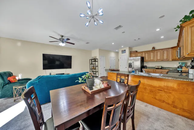 a view of a dining room with furniture