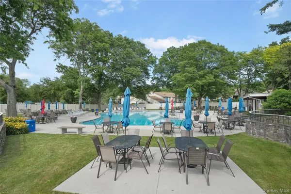 a view of swimming pool with a yard