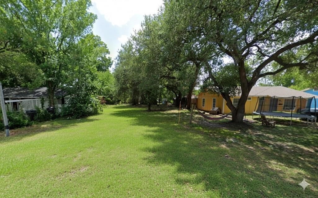 3626 Corksie Street Houston, TX 77051 - Photo 1 of 6 a view of a house with backyard and sitting area