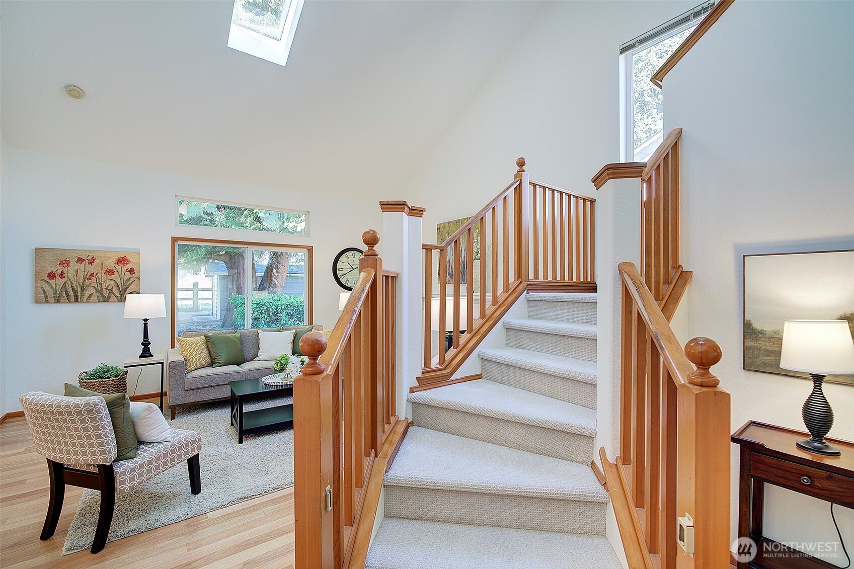 3002 200th Street Southeast Bothell, WA 98012 - Photo 14 of 34 a living room with furniture and a stair with wooden floor