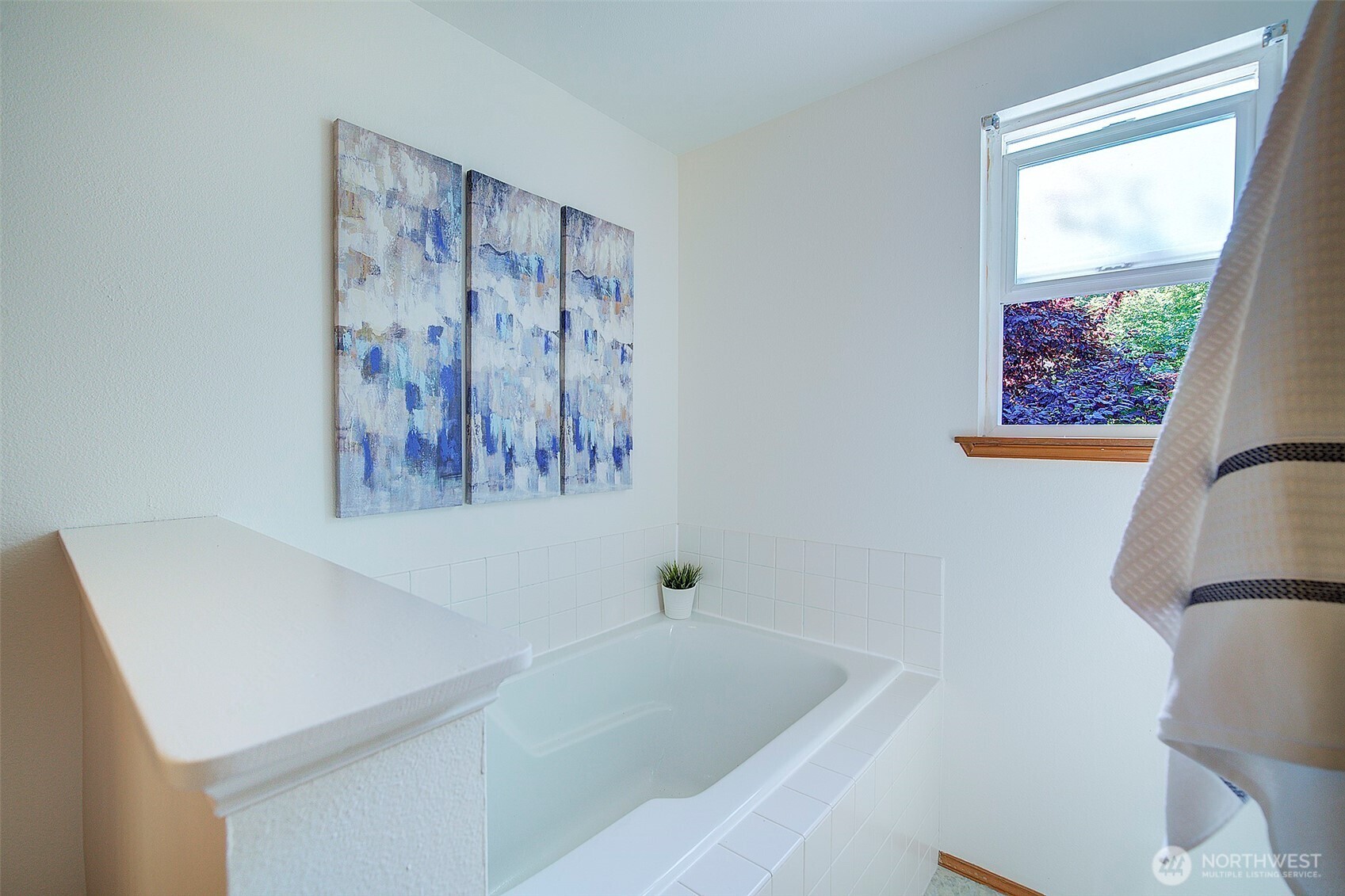3002 200th Street Southeast Bothell, WA 98012 - Photo 20 of 34 a bathroom with a sink and a bathtub