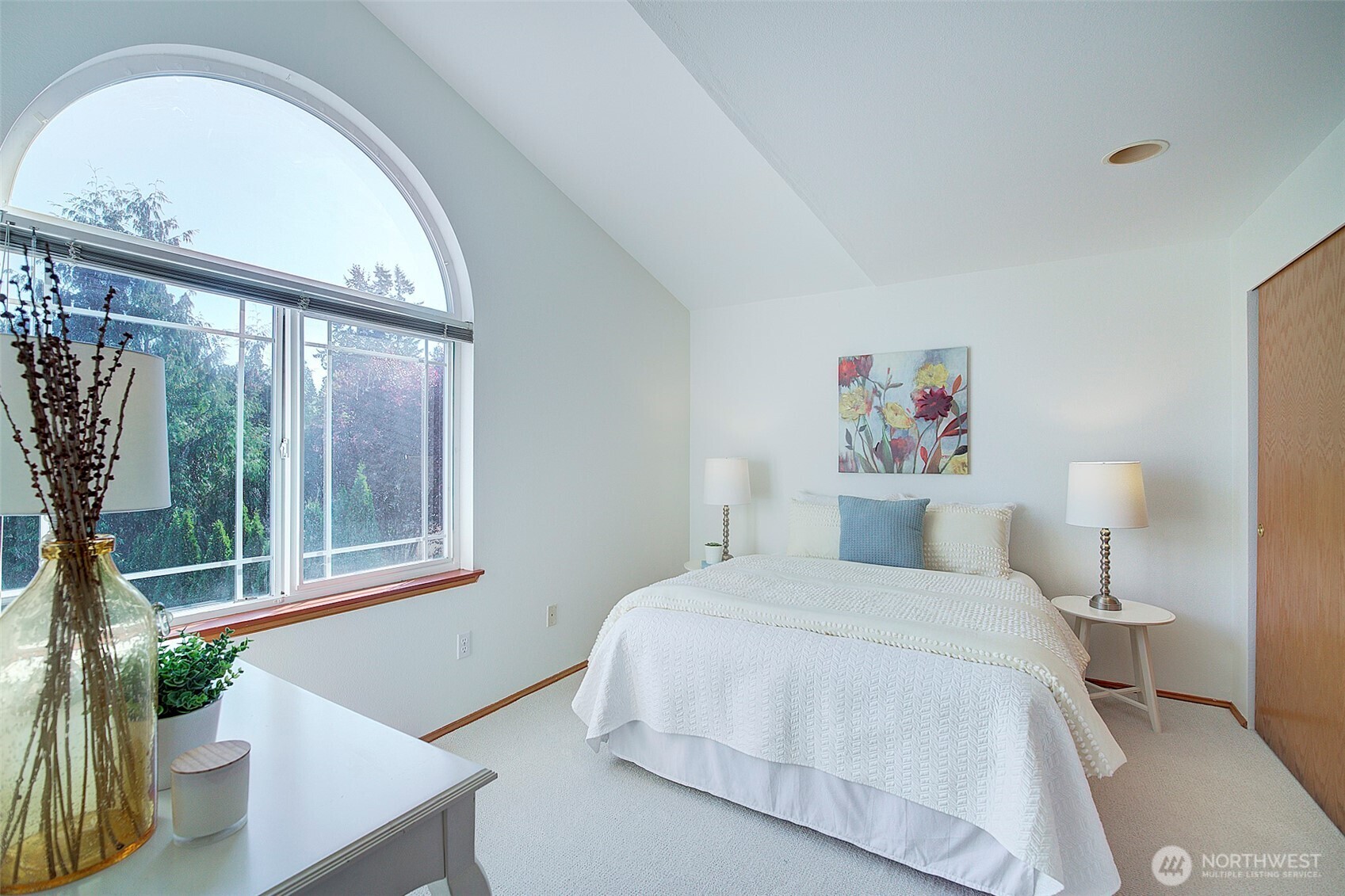 3002 200th Street Southeast Bothell, WA 98012 - Photo 23 of 34 a bedroom with a bed and a large window