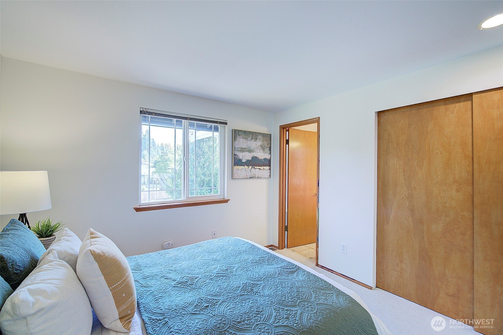 3002 200th Street Southeast Bothell, WA 98012 - Photo 28 of 34 a bedroom with a bed and a window