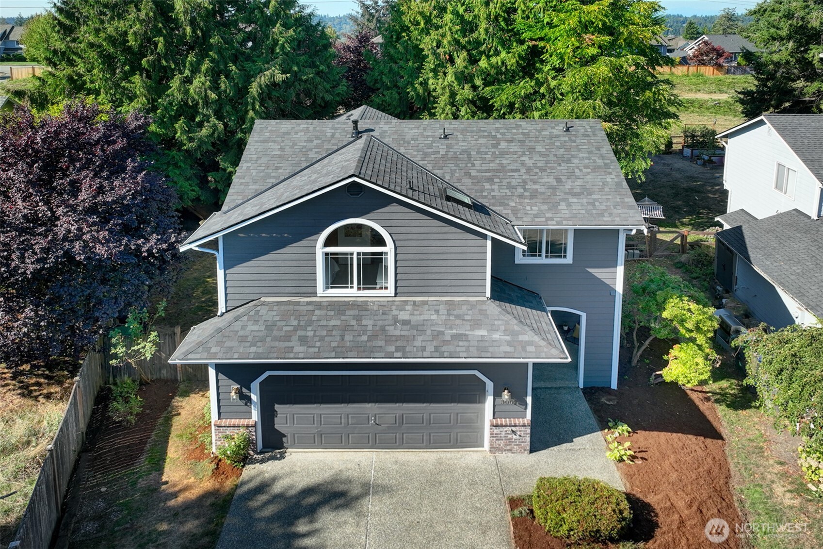 3002 200th Street Southeast Bothell, WA 98012 - Photo 34 of 34 a view of a house with a yard