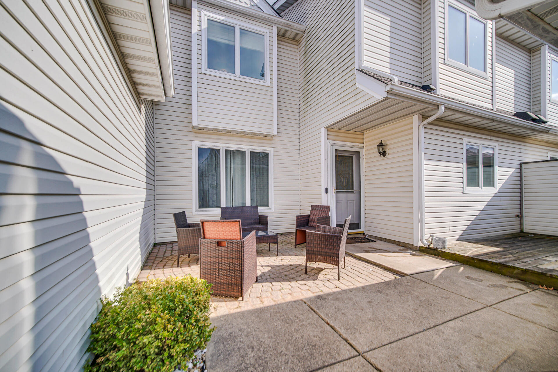 9993 Hunters Run St. John, IN 46373 - Photo 4 of 28 a backyard of a house with outdoor seating