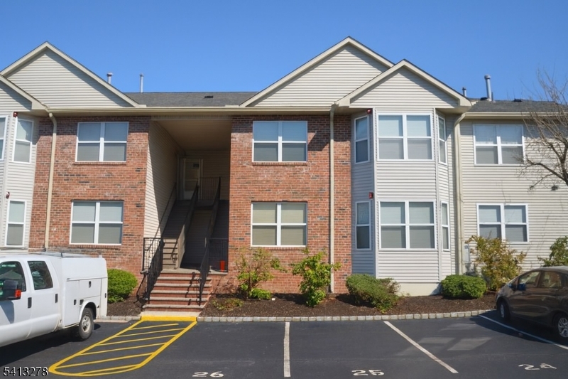 13 Gracie Road East Hanover, NJ 07936 - Photo 1 of 15 a front view of a house with a yard
