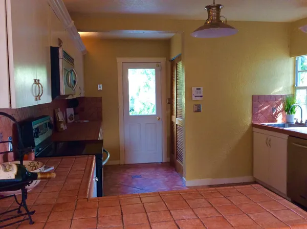 a view of livingroom with furniture and a fireplace