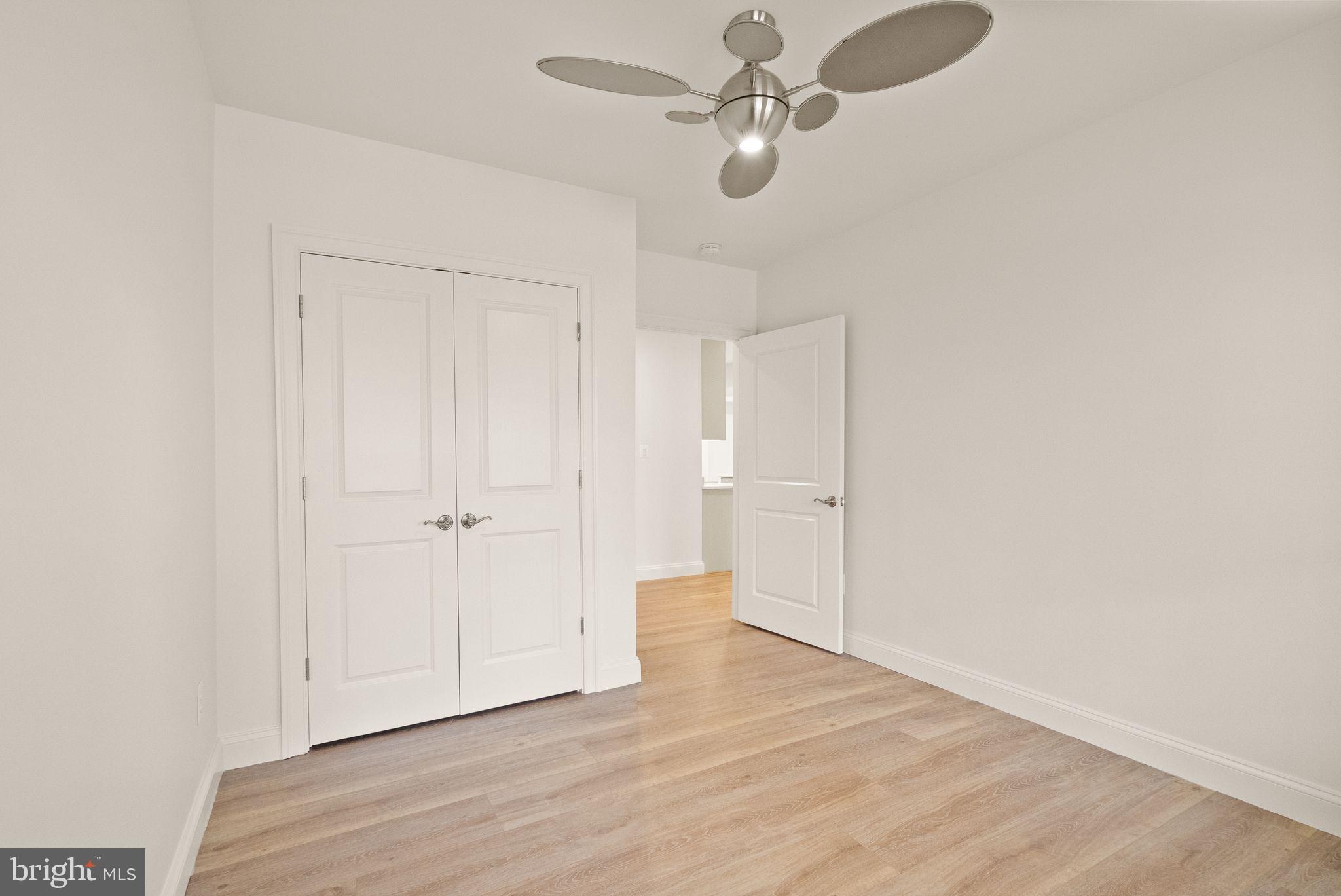 24974 First Harvest Court Aldie, VA 20105 - Photo 104 of 143 a view of empty room with wooden floor