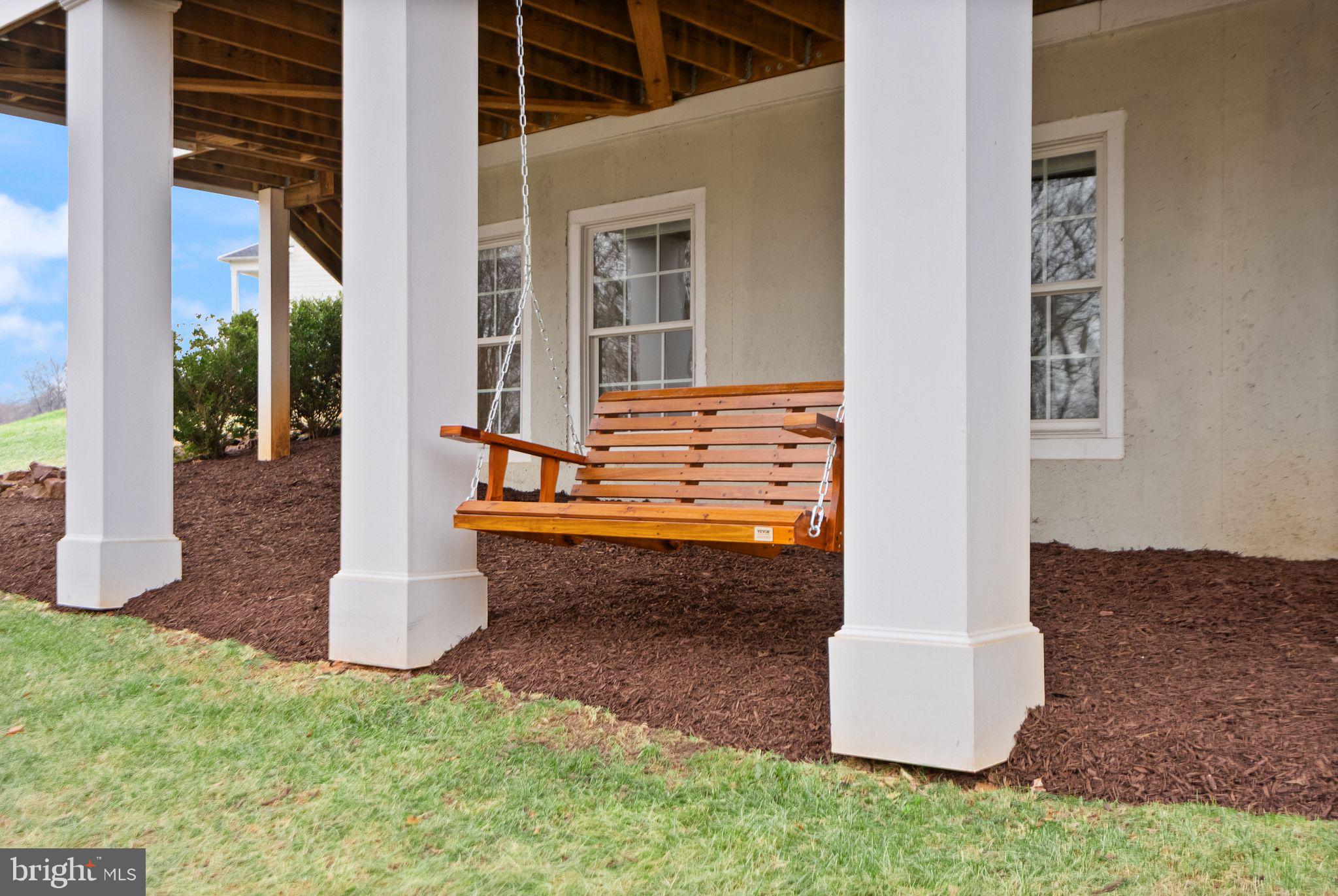 24974 First Harvest Court Aldie, VA 20105 - Photo 109 of 143 a front view of a house with a yard