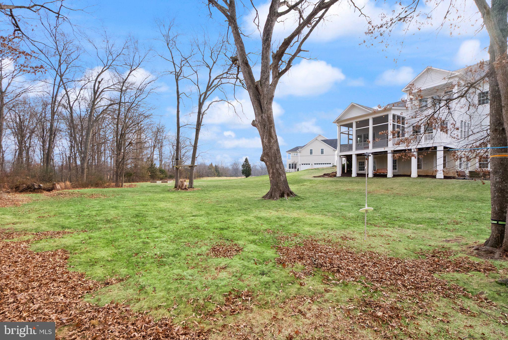 24974 First Harvest Court Aldie, VA 20105 - Photo 118 of 143 a view of a house with a yard