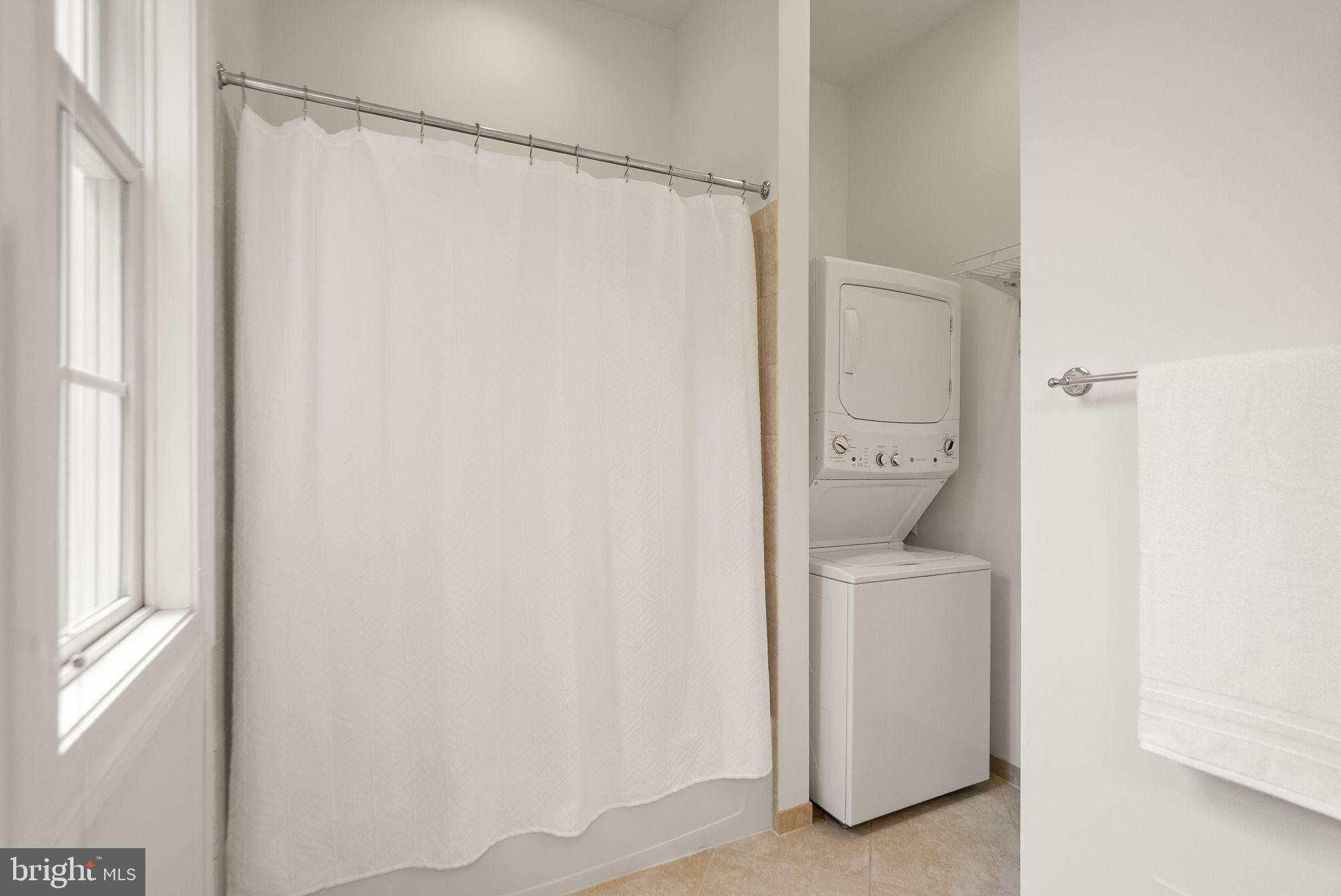 24974 First Harvest Court Aldie, VA 20105 - Photo 50 of 143 Bathtub and stackable washer/dryer