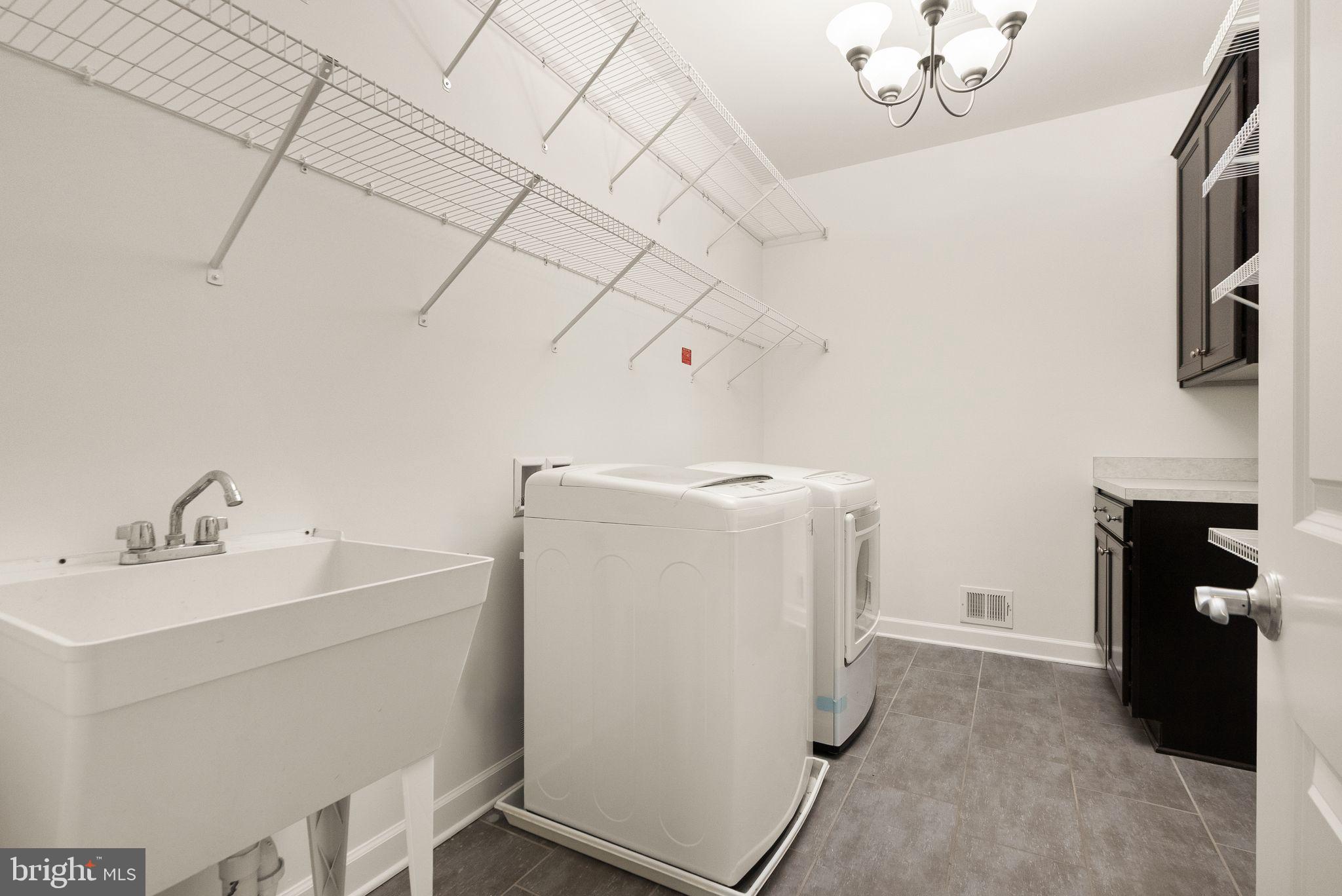 24974 First Harvest Court Aldie, VA 20105 - Photo 85 of 143 Laundry room upstairs with utility sink