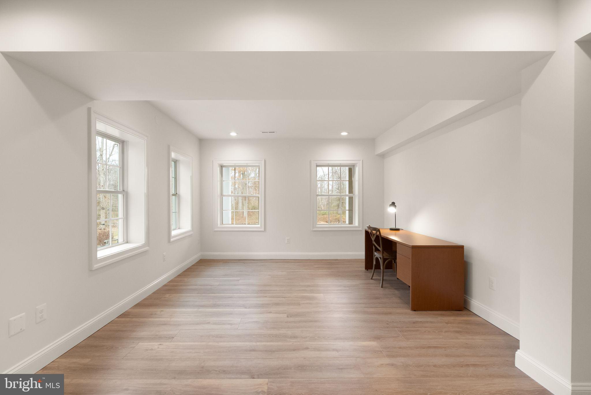 24974 First Harvest Court Aldie, VA 20105 - Photo 97 of 143 wooden floor in an empty room with a window