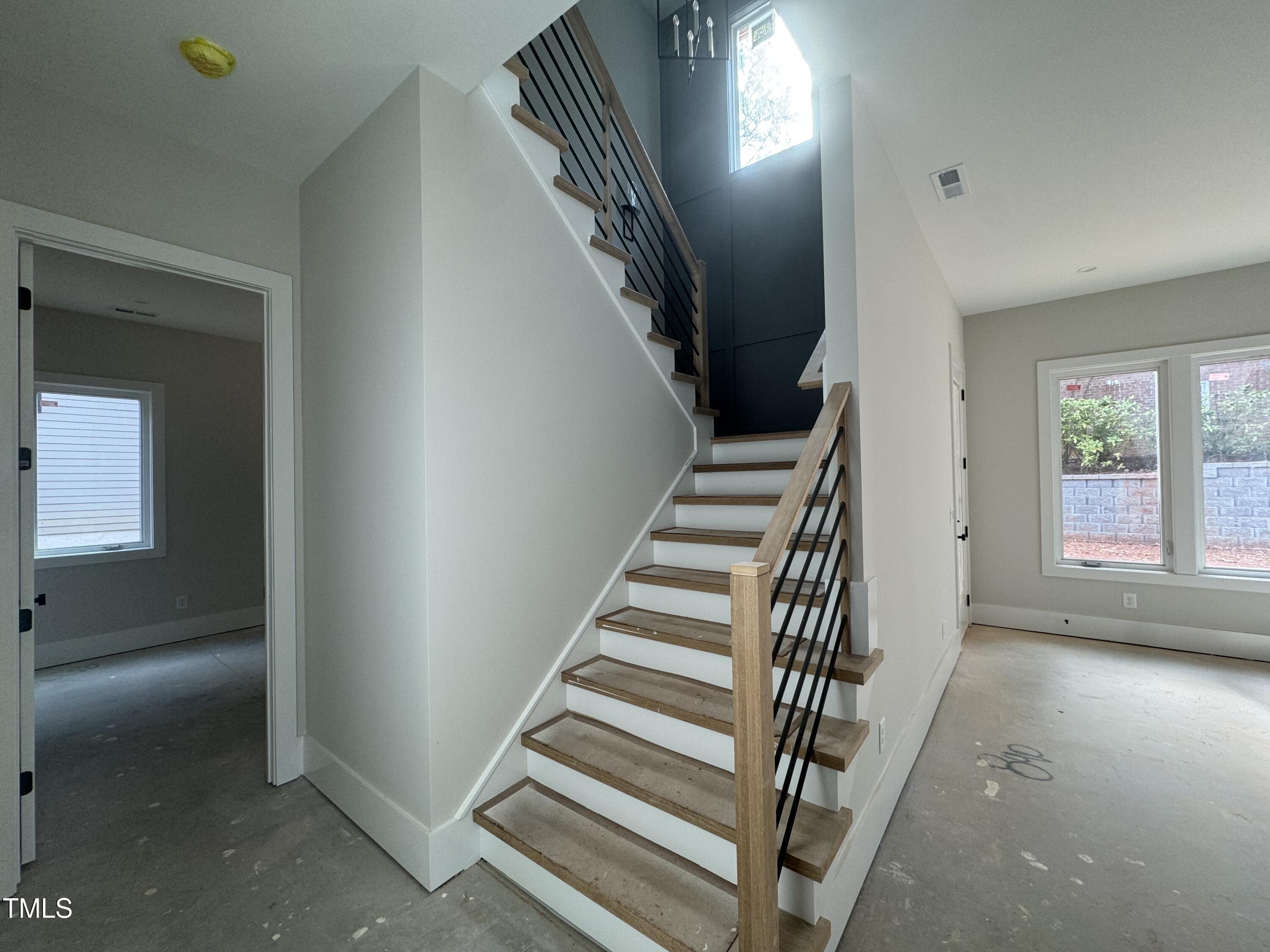 2317 Turners Alley Raleigh, NC 27607 - Photo 6 of 8 a view of entryway and hall with wooden floor