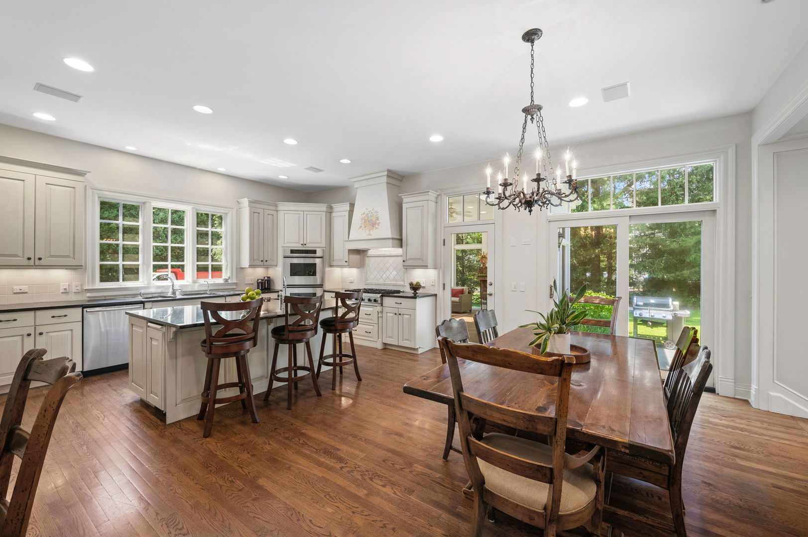 228 Old Green Bay Road Glencoe, IL 60093 - Photo 11 of 40 a view of a dining room with furniture window and wooden floor