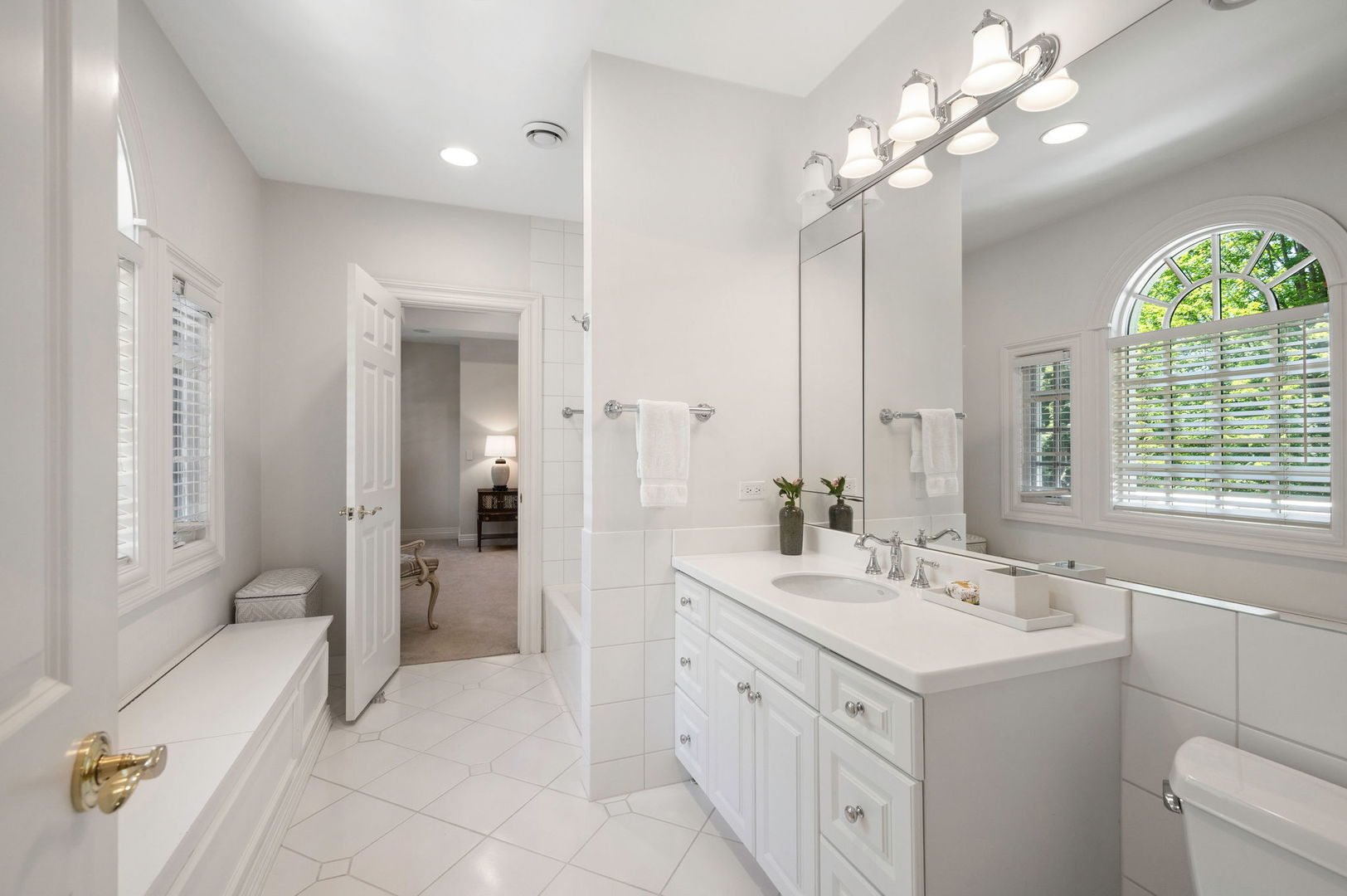 228 Old Green Bay Road Glencoe, IL 60093 - Photo 25 of 40 a bathroom with a sink a vanity a mirror and a shower