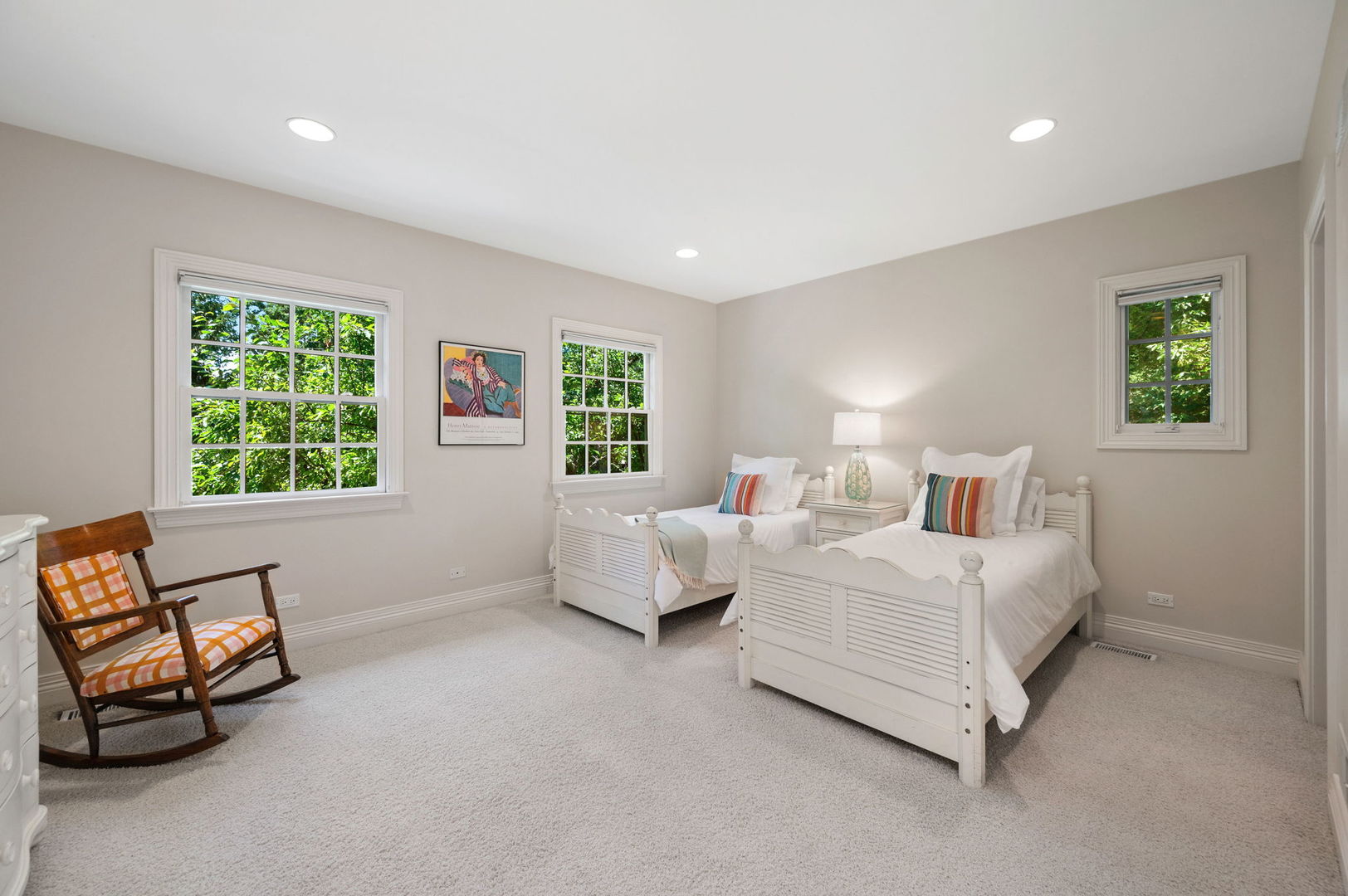 228 Old Green Bay Road Glencoe, IL 60093 - Photo 28 of 40 a spacious bedroom with a bed and a couch