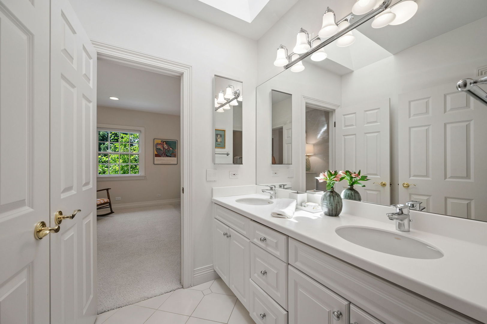 228 Old Green Bay Road Glencoe, IL 60093 - Photo 29 of 40 a bathroom with a sink and a mirror