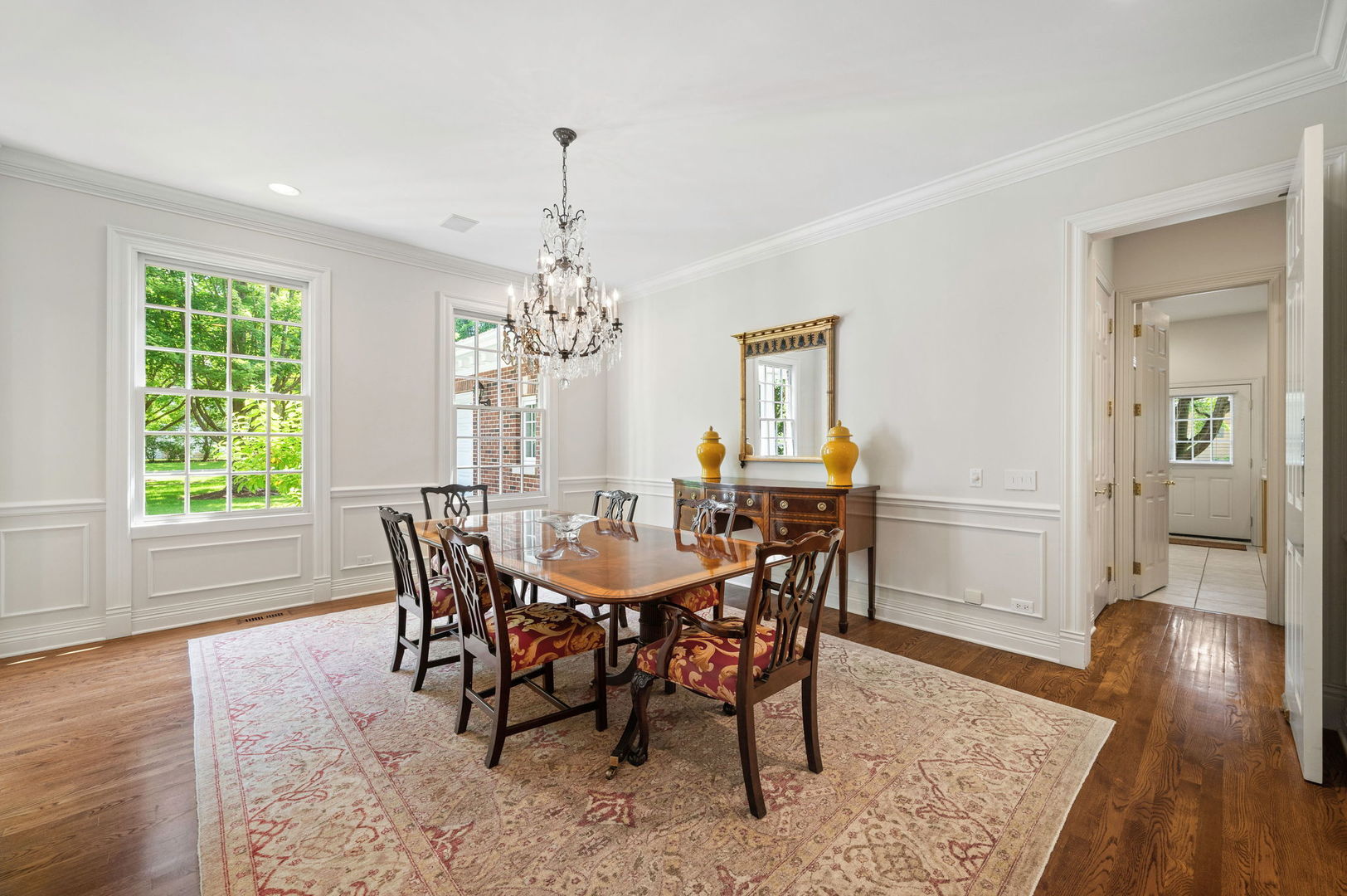228 Old Green Bay Road Glencoe, IL 60093 - Photo 4 of 40 a view of a dining room with furniture window and wooden floor