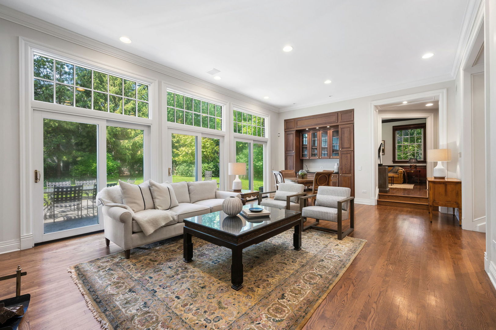 228 Old Green Bay Road Glencoe, IL 60093 - Photo 8 of 40 a living room with furniture and large windows