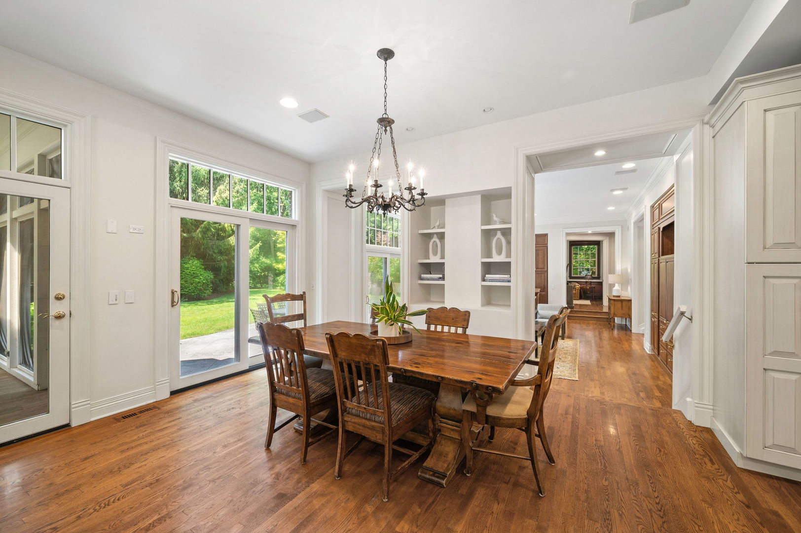 228 Old Green Bay Road Glencoe, IL 60093 - Photo 10 of 40 a view of a dining room with furniture window and wooden floor