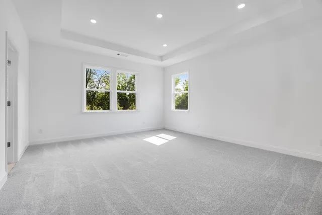 an empty room with windows