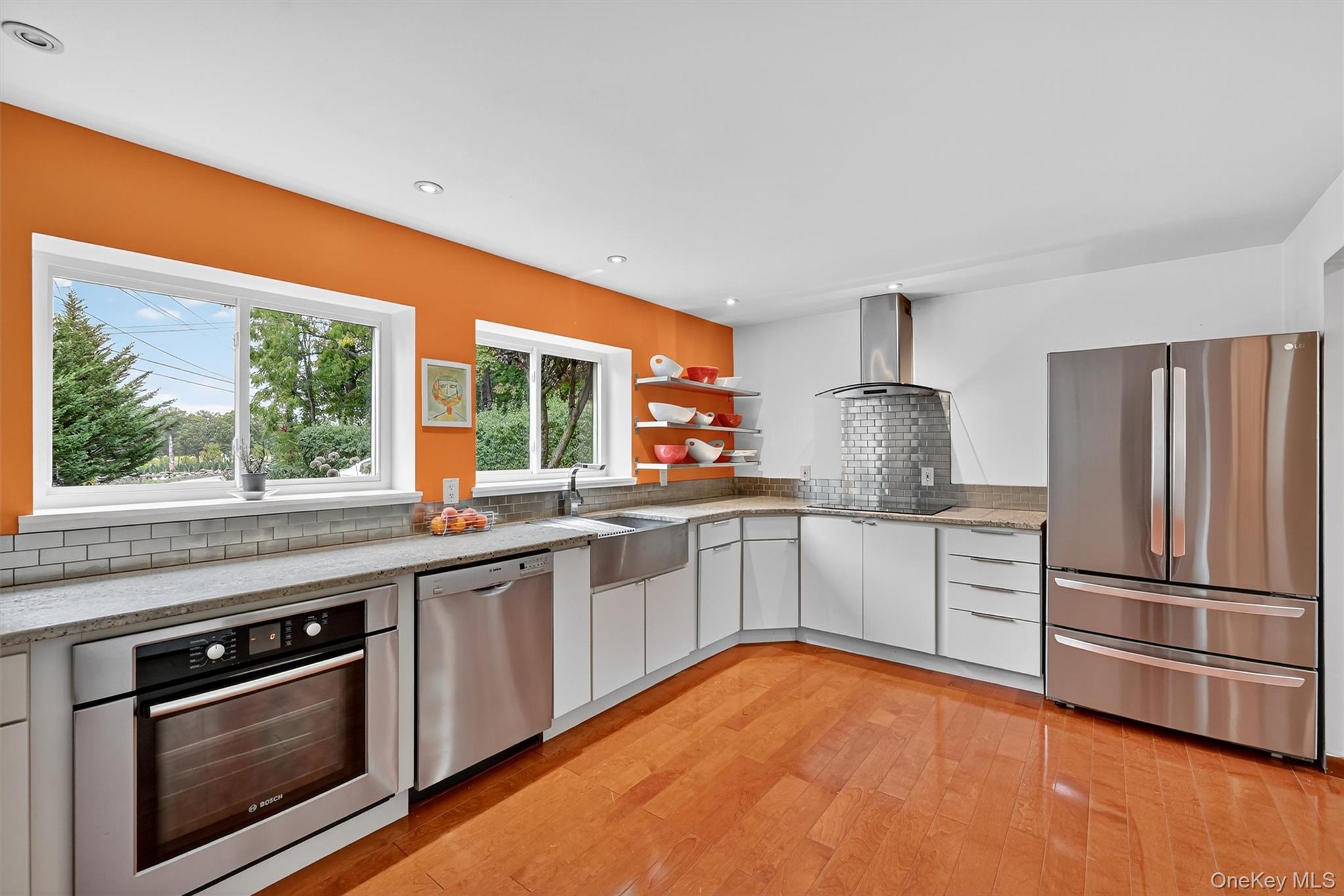 2 Tenny Lane Cornwall, NY 12518 - Photo 12 of 44 Kitchen with stainless steel appliances, white cabinets, light stone counters