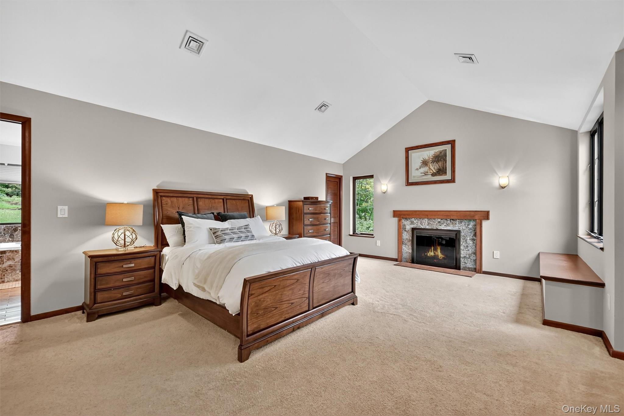2 Tenny Lane Cornwall, NY 12518 - Photo 23 of 44 Primary bedroom with wood burning fireplace