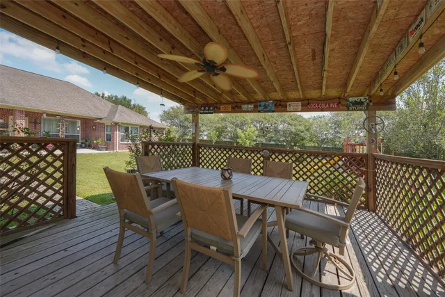 a view of a chairs and table in the patio