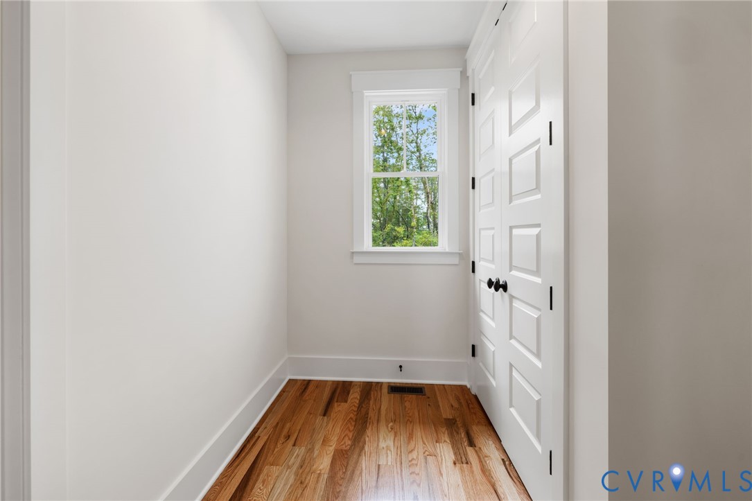 3525 Ampfield Way Midlothian, VA 23112 - Photo 14 of 35 a view of a room with wooden floor and a window