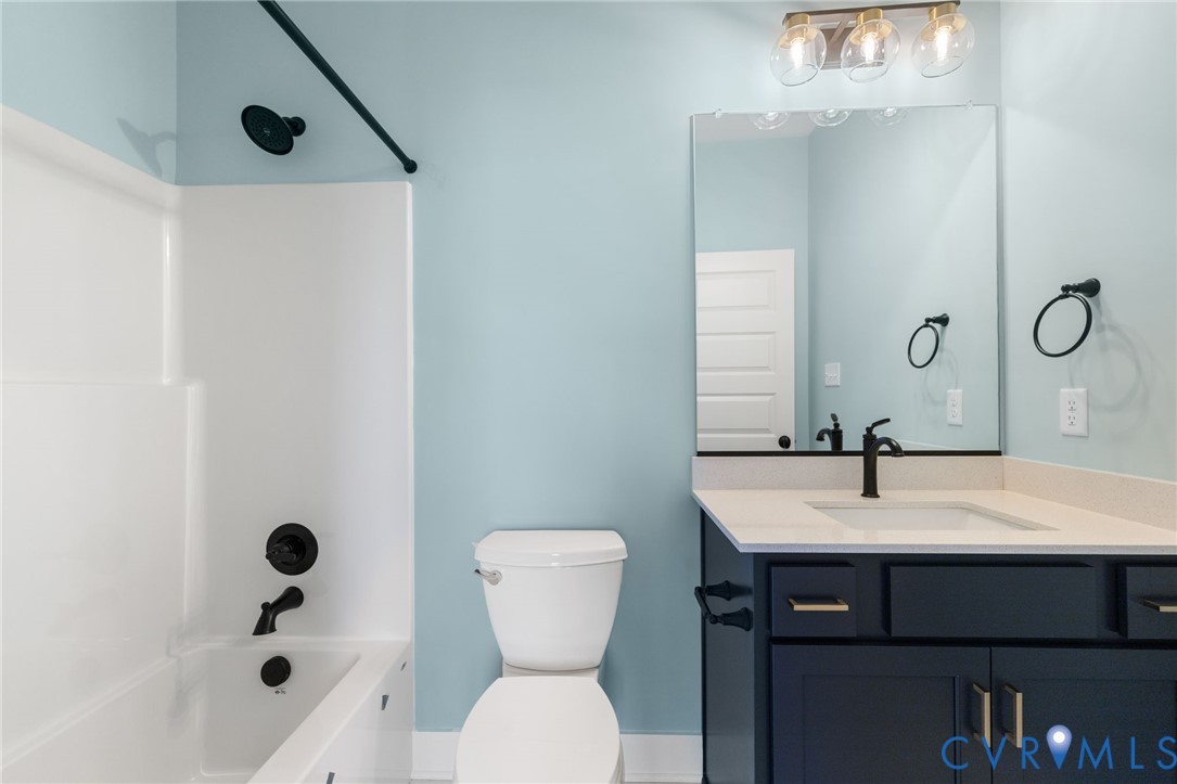3525 Ampfield Way Midlothian, VA 23112 - Photo 18 of 35 a bathroom with a sink toilet and shower