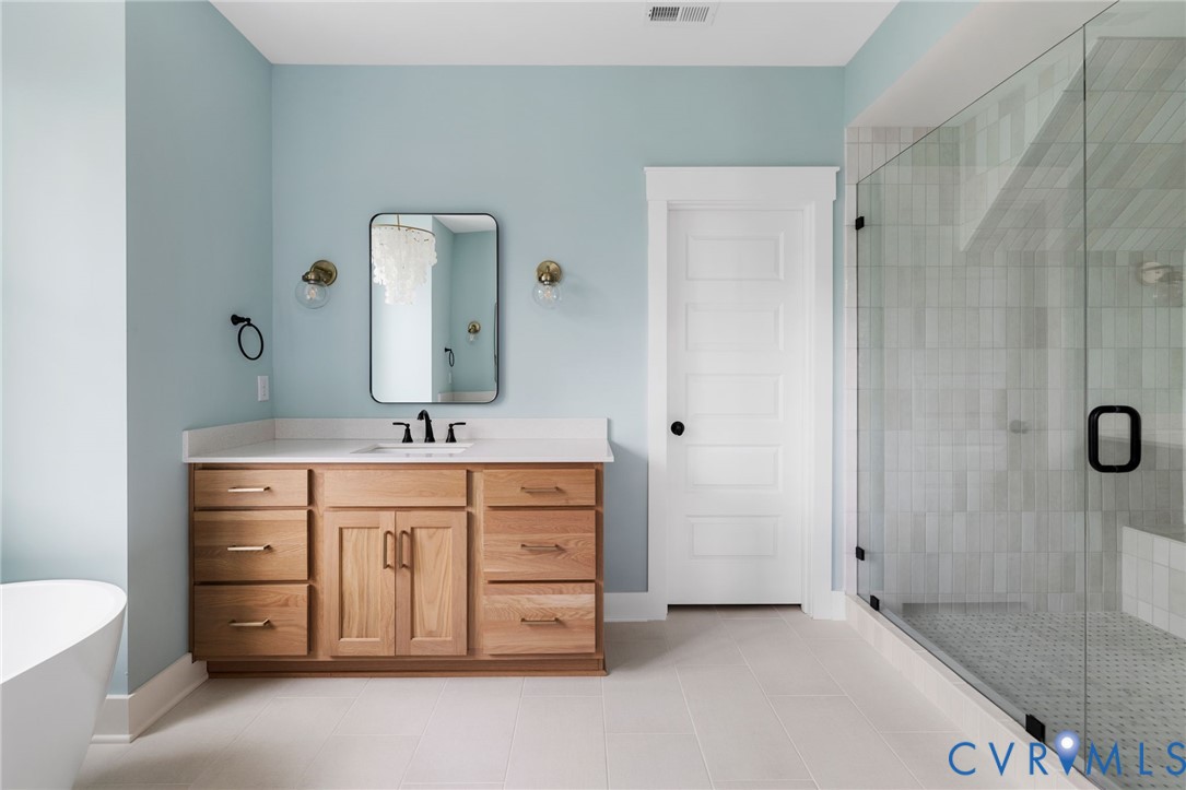3525 Ampfield Way Midlothian, VA 23112 - Photo 29 of 35 a bathroom with a double vanity sink mirror and double