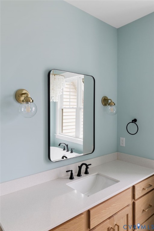 3525 Ampfield Way Midlothian, VA 23112 - Photo 31 of 35 a bathroom with a sink and a mirror