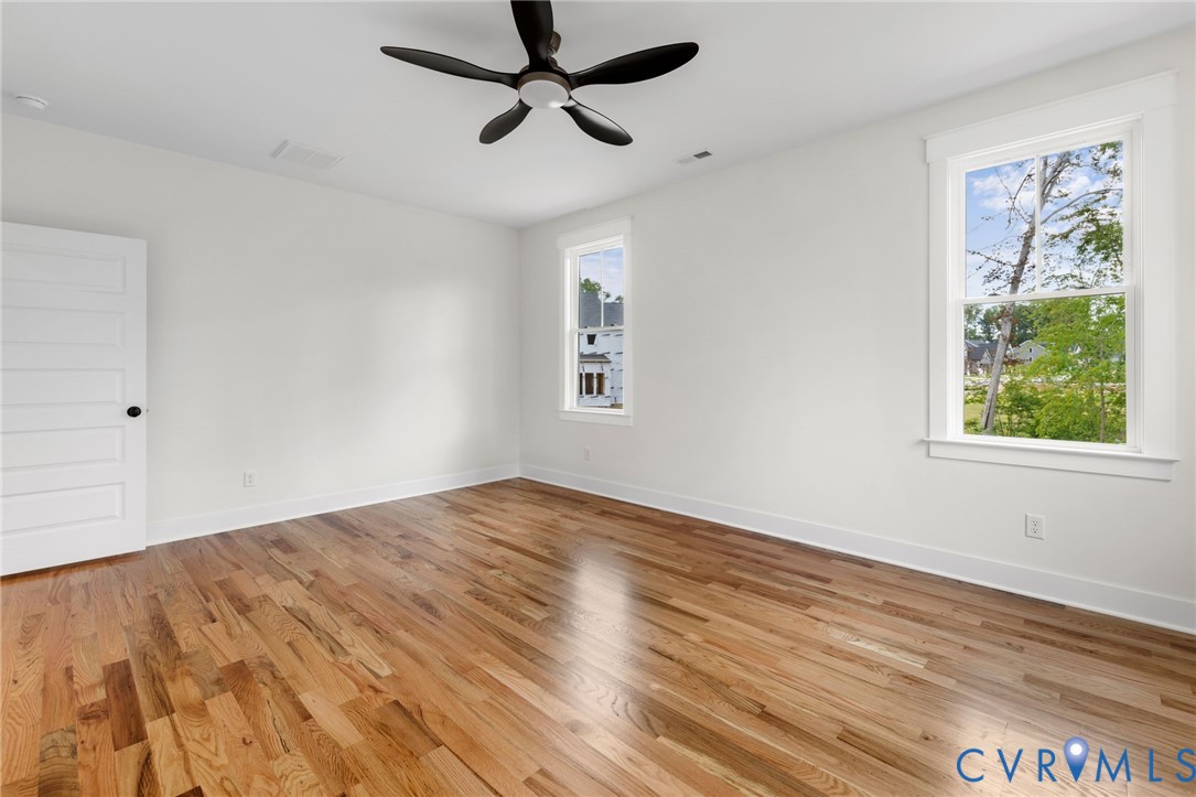 3525 Ampfield Way Midlothian, VA 23112 - Photo 34 of 35 a view of empty room with wooden floor and fan