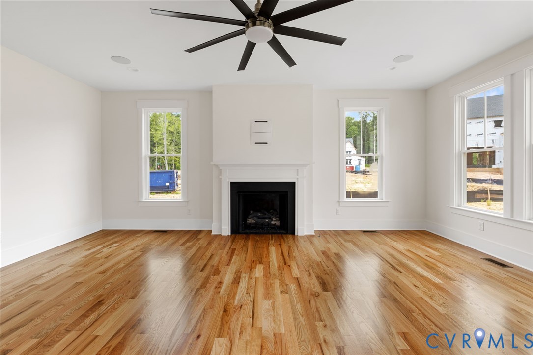 3525 Ampfield Way Midlothian, VA 23112 - Photo 6 of 35 a view of an empty room with window and fireplace