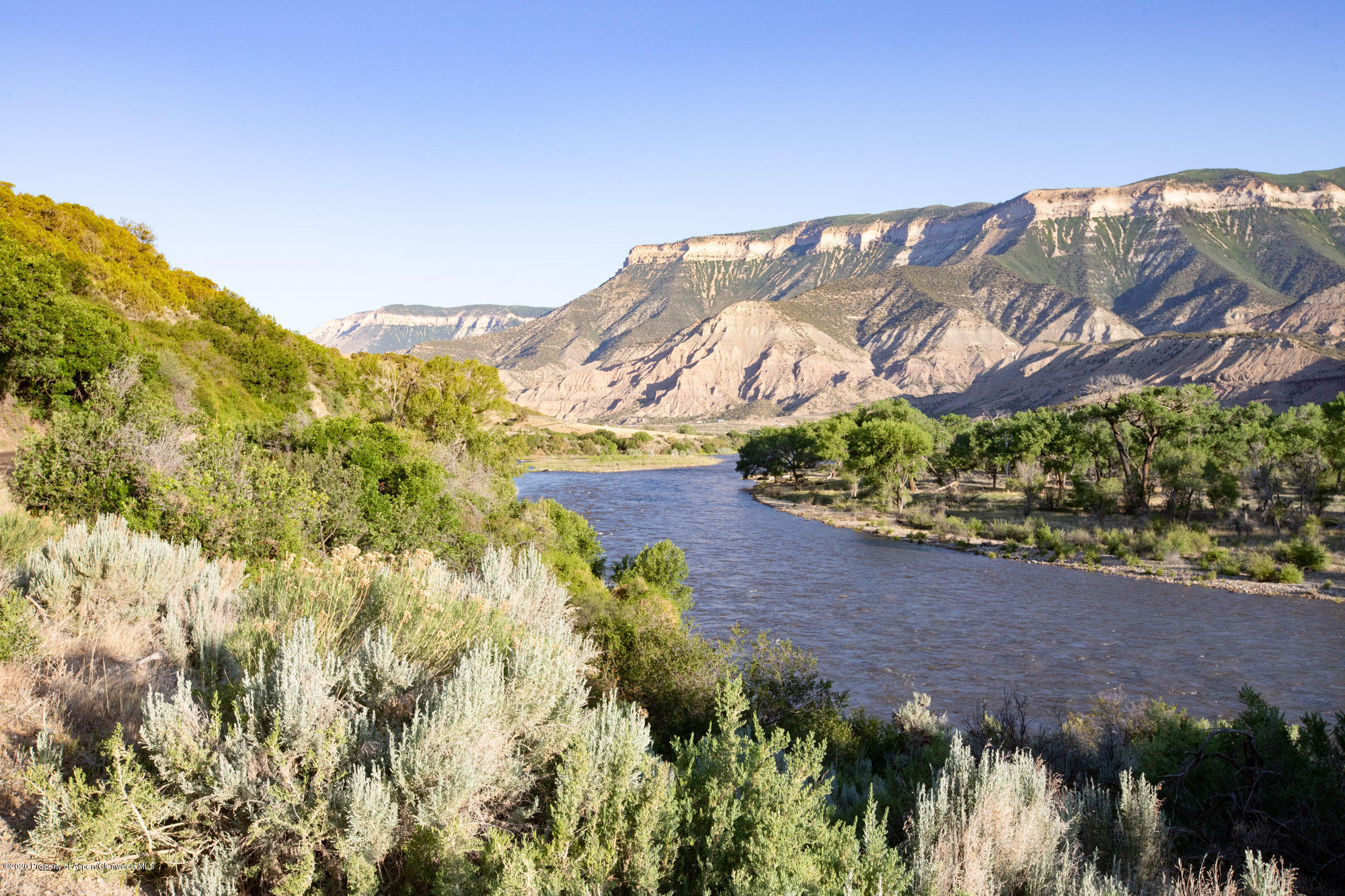 1989 County Road 320 Rifle, CO 81650 - Photo 2 of 36 a view of a street with a building in the background