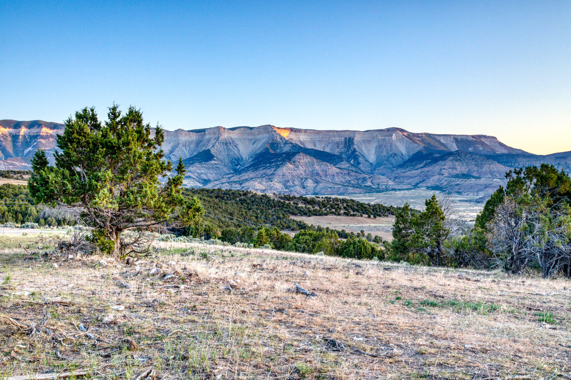 1989 County Road 320 Rifle, CO 81650 - Photo 9 of 36 a view of a house with a mountain