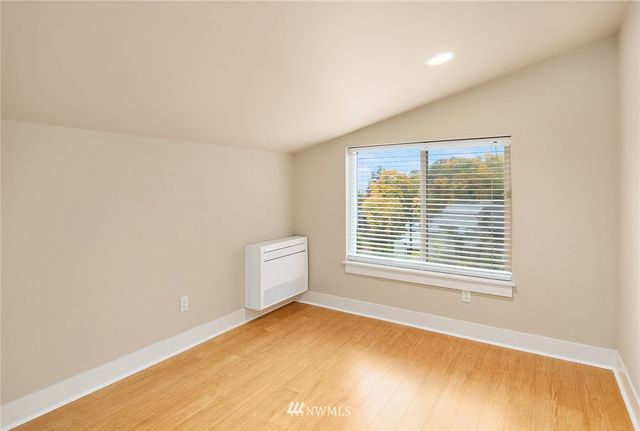 a bathroom with a sink toilet tub and shower
