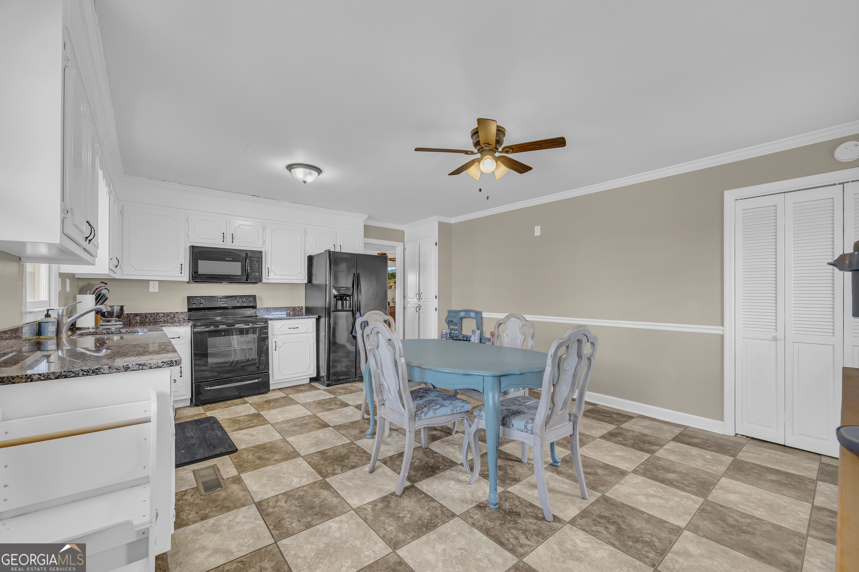 975 Diamond Hill Neese Road Colbert, GA 30628 - Photo 17 of 59 a view of a dining room kitchen and a window