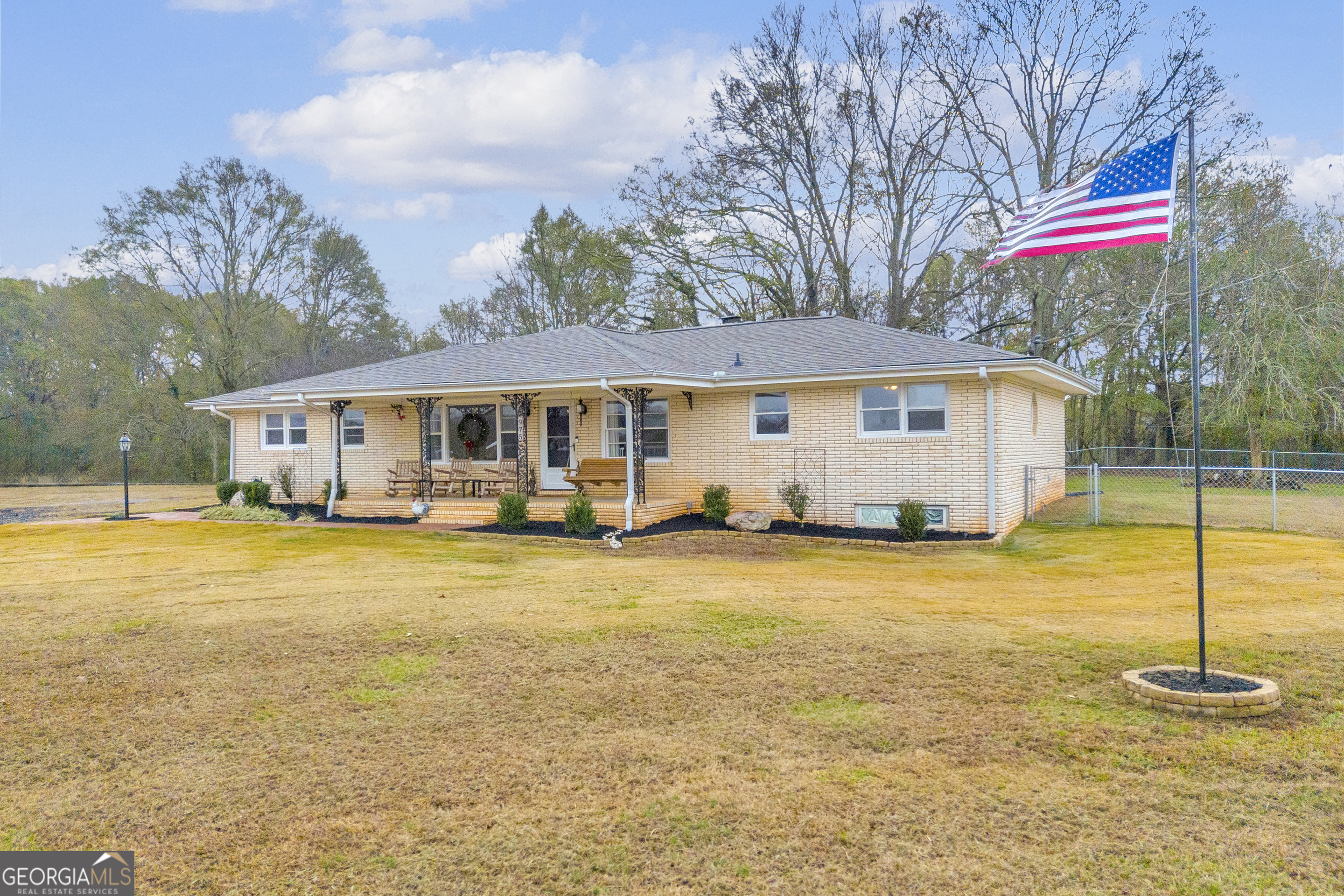 975 Diamond Hill Neese Road Colbert, GA 30628 - Photo 2 of 59 a front view of a house with swimming pool