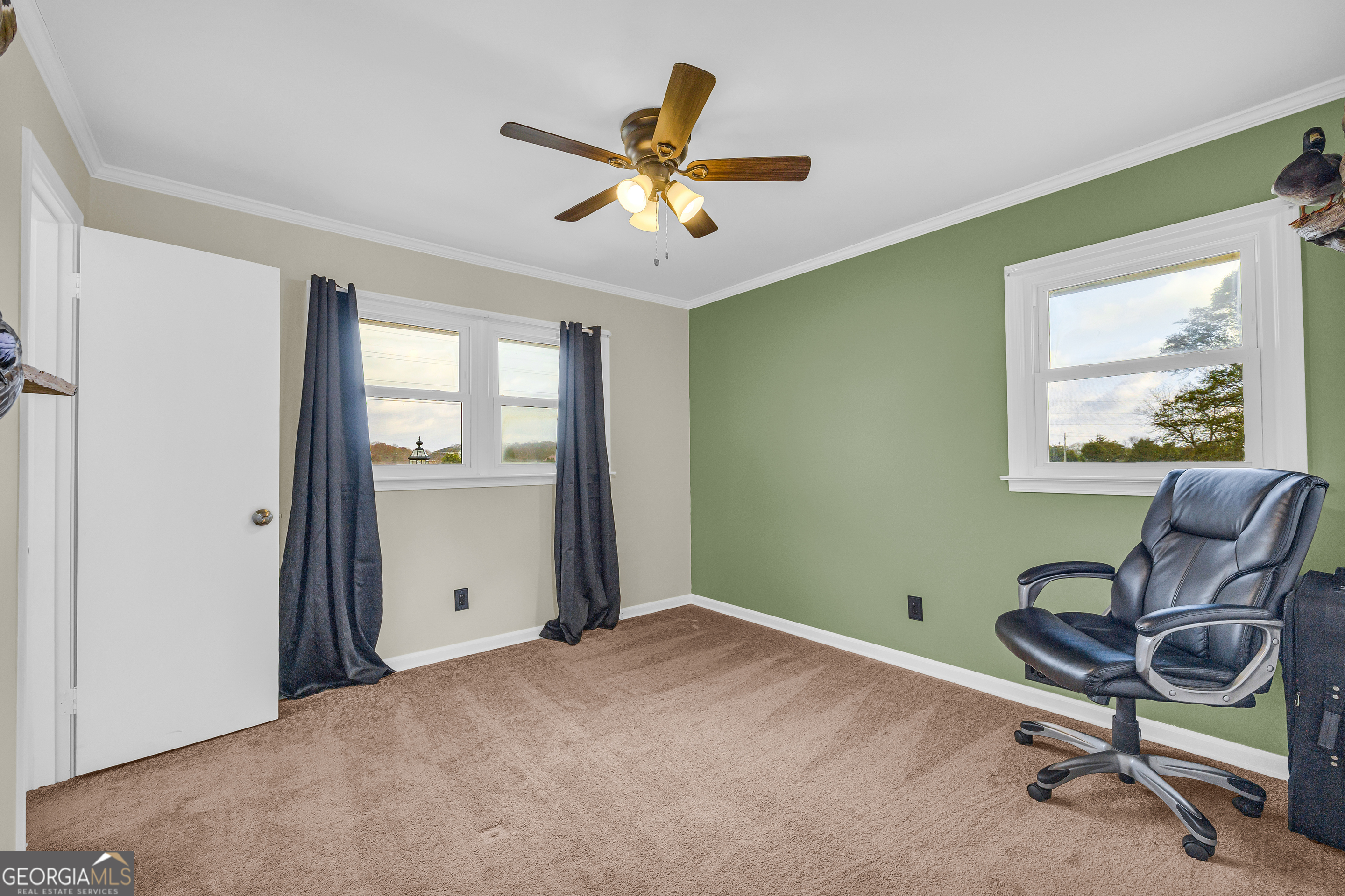 975 Diamond Hill Neese Road Colbert, GA 30628 - Photo 21 of 59 a workspace with wooden floor and a window