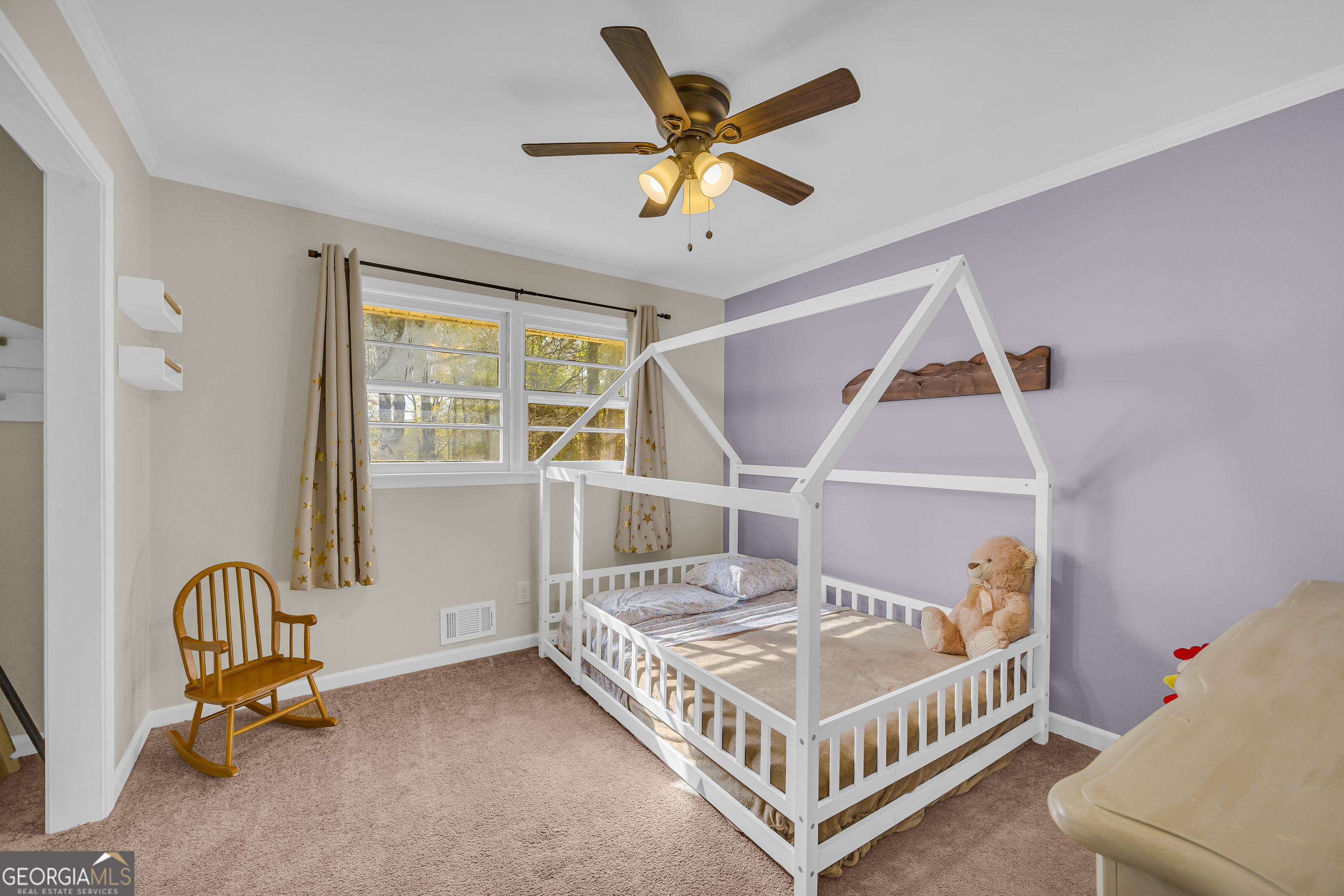 975 Diamond Hill Neese Road Colbert, GA 30628 - Photo 24 of 59 a bedroom with a bed and a window