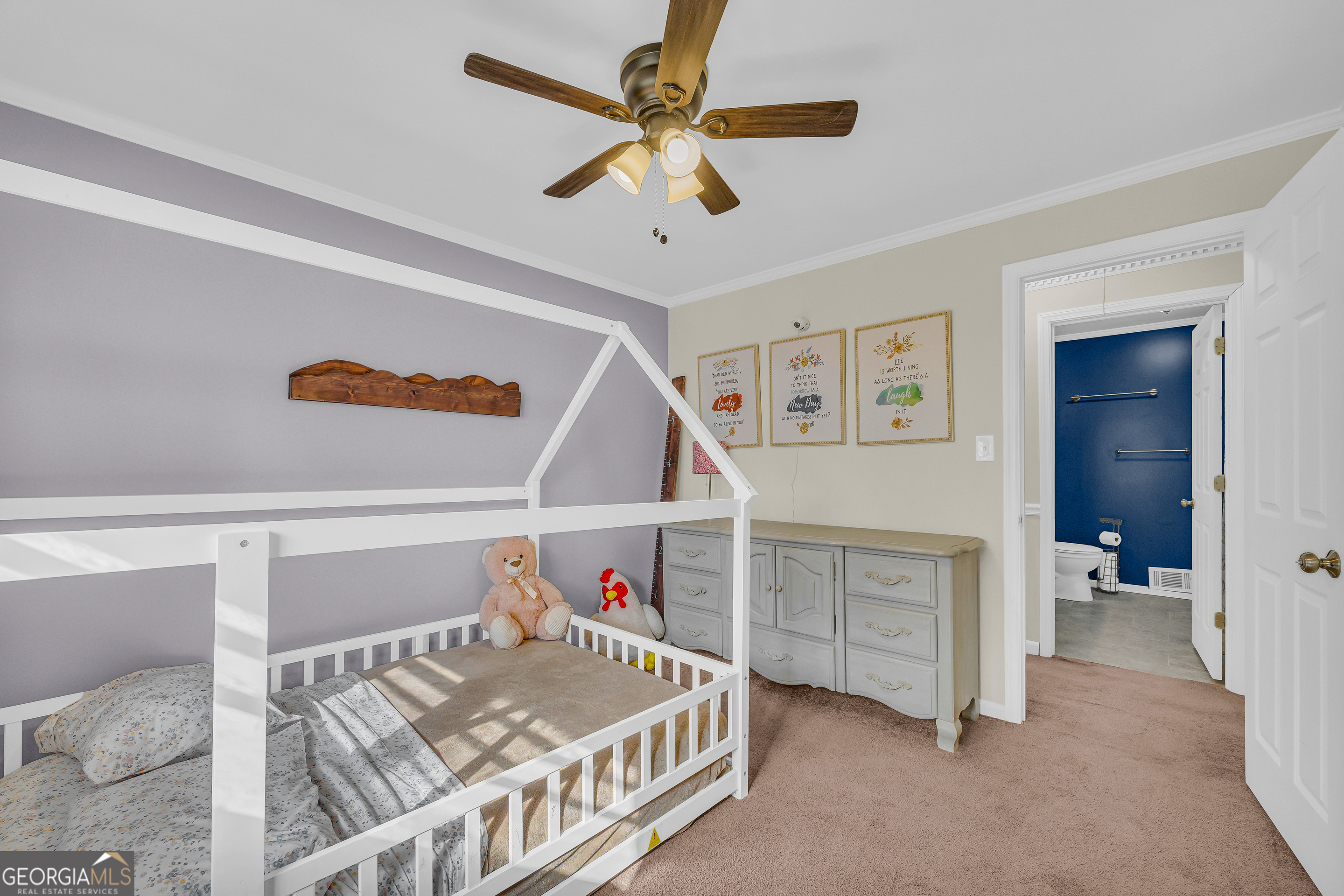 975 Diamond Hill Neese Road Colbert, GA 30628 - Photo 25 of 59 a bedroom with a bed and a ceiling fan